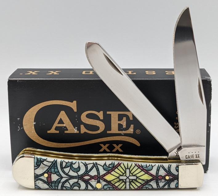 2022 Case XX Stained Glass Cross Angel Trapper: 2022 Case XX Stained Glass Cross Angel Natural Bone Color Wash Trapper in Original Packaging. Knife is in like new condition. Largest blade length of 3-1/4in and overall length of 7-3/8in when open.
