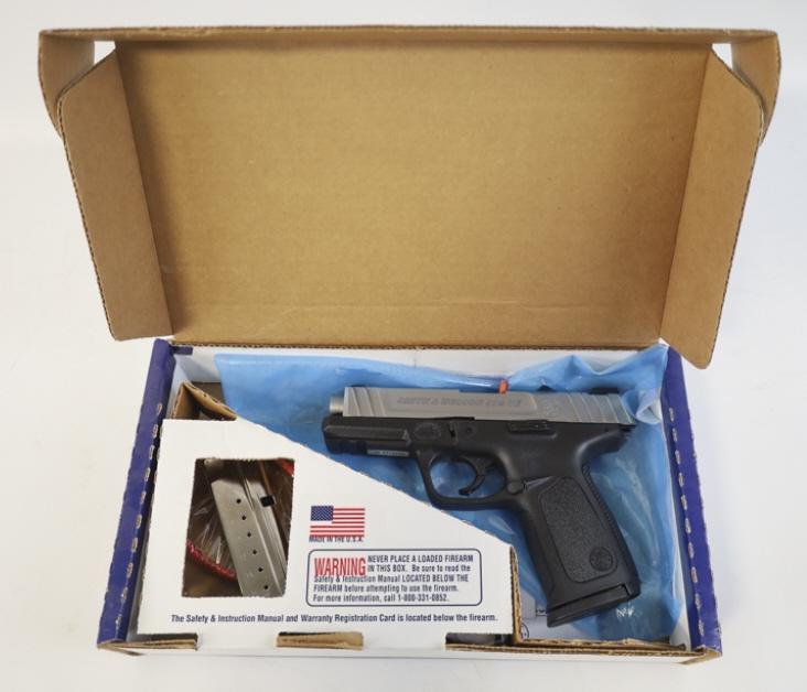 Smith & Wesson SD9 VE Semi-Automatic Pistol NIB: New in box Smith & Wesson Model SD9 VE semi-automatic pistol in 9mm. The stainless & black pistol is in new unfired condition with a 4" barrel. Comes with lock, (2) 16 round magazines and paperwork. S