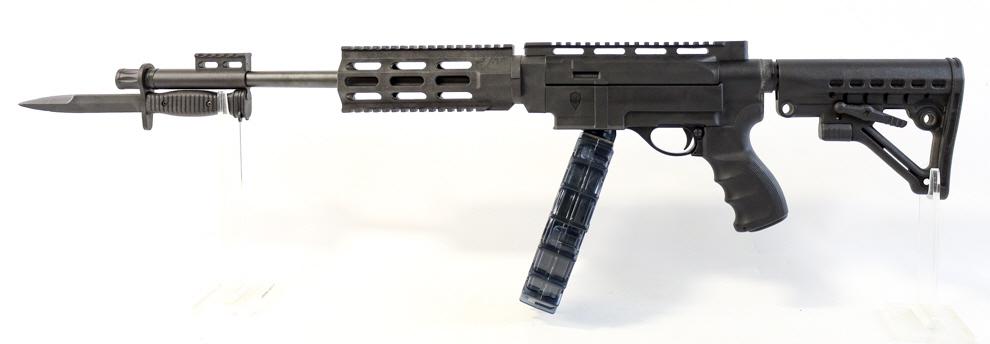 Remington 597 Archangel Semi-Auto .22LR Rifle: Remington Model 597 with an Archangel 5.97 conversion semi-automatic rifle in .22 long rifle. The rifle is in nice condition and has a 20" barrel. Comes with bayonet and a Pro Mag 70 round drum mag. S