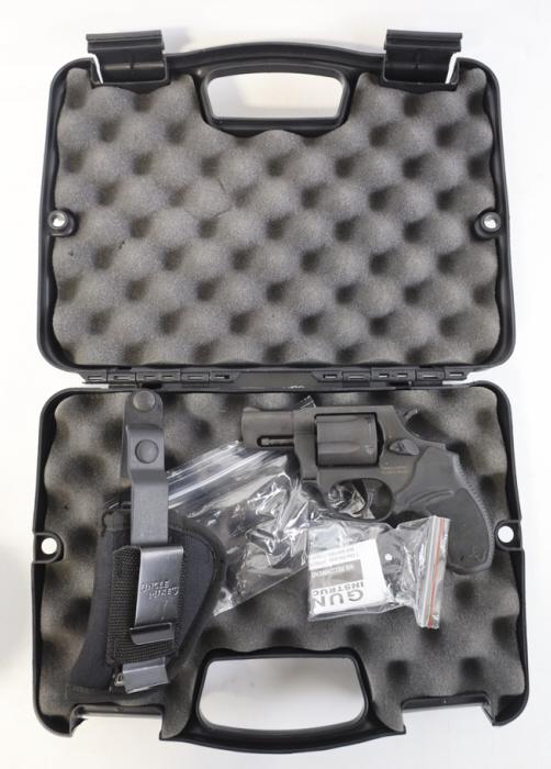 Taurus Model 905 Five-Shot 9mm Revolver: Taurus Model 905 five-shot revolver in 9mm. The flat black finish revolver is in nice condition and has a 2" barrel. Comes with moon clips and Uncle Mikes holster. SN: MU12981. FFL required for transf