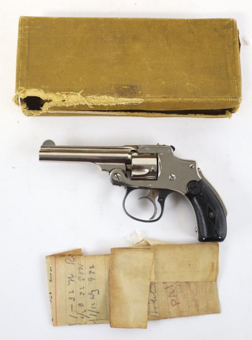 Smith & Wesson Departure .32 Cal. Revolver In Box: In the original box Antique Smith & Wesson Departure Safety Hammerless (Lemon Squeezer) top-break five-shot revolver in .32 caliber. The nickel finish revolver is in very nice condition with a 3-1/2" 