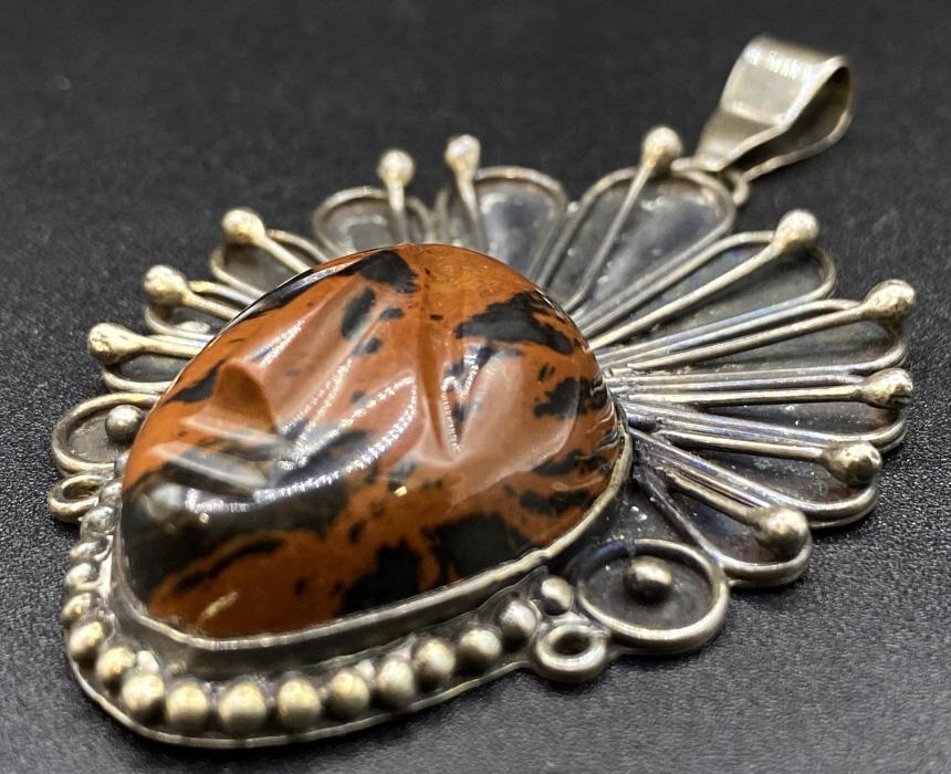 Sterling Silver Red Jasper Figural Pendant: Sterling silver red jasper figural pendant. Pendant measures 3" tall including bail. Total weight 25.3 grams.