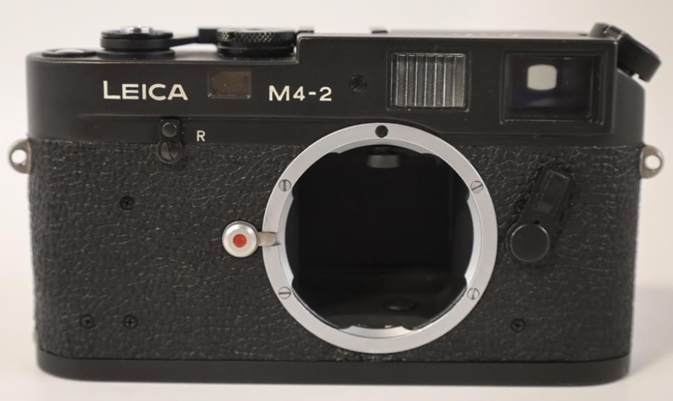 Leica M4-2 35mm Rangefinder Film Camera Body: Leica M4-2 35mm Rangefinder Film Camera Body made by Leitz. Camera has a bright and clear viewfinder, Black enamel body is clean. Excellent condition. Serial No. 1246577.