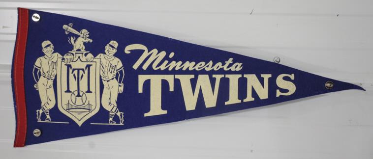 Vintage Minnesota Twins Felt Pennant: Nice condition with bright color. Features two players and a squirrel. Measures 28-3/4" across x 11-3/4" tall.
