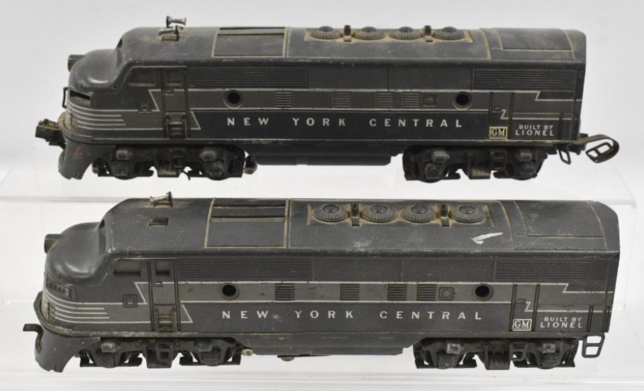 Lionel New York Central #2344 F3 AA Units: Lionel New York Central #2344 F3 AA engine units. The one cab is missing the numbers. Both have paint loss, corrosion, and wear from use and age.