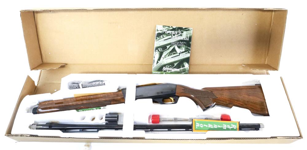 Remington 1100 Sporting .410 Gauge Shotgun NIB: Remington Model 1100 Sporting semi-automatic shotgun in .410 Gauge. The shotgun is in new unfired condition in the original box and has a 27" vent rib barrel. Comes with five screw in choke tubes, pap