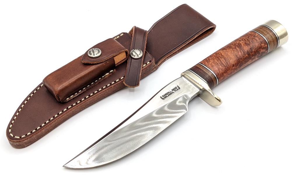 Randall Model 27 Trailblazer w/ Randall Sheath: Randall Made Model 27 Trailblazer w/ Randall Sheath. Knife is in like new condition with thuya burl wood handle and nickel hardware. Blade length of 5.75in and overall length of 10.5in