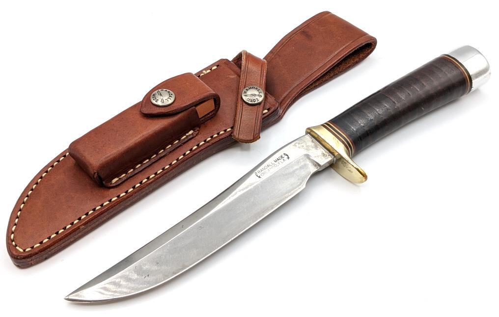 Randall Made Model 3 Hunter w/ Randall Sheath: Randall Made Model 3 Hunter w/ Randall Sheath. Knife comes with stacked leather handle, brass guard and nickel bolster, and nut pommel. Knife is in used condition with scratches on the blade from shar