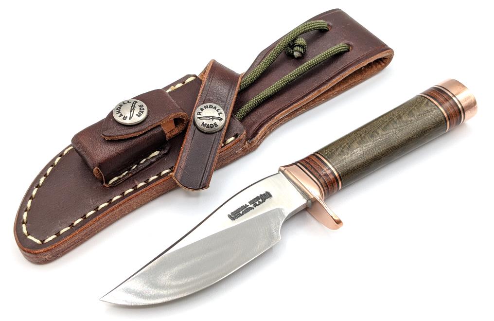 Randall Made Model 27 Mini Trailblazer w/ Sheath: Randall Made Model 27 Mini Trailblazer w/ Randall Sheath. Knife comes with green micarta handle, stacked leather spacers, and brass guard and butt cap. Knife is in like new condition. Blade length of 