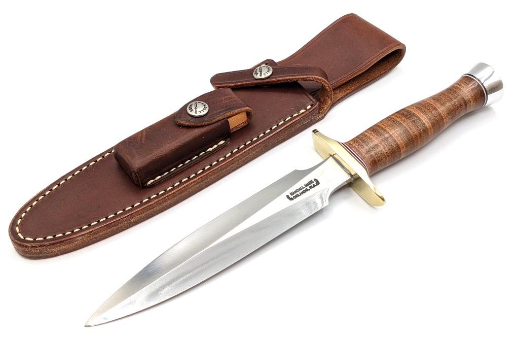Randall Made Model 2 Fighting Stiletto w/ Sheath: Randall Made Model 2 Fighting Stiletto w/ Randall Sheath. Knife comes with stacked leather handle, brass guard, and nickel butt cap. Knife is in like new condition. Blade length of 6-7/8in and overall