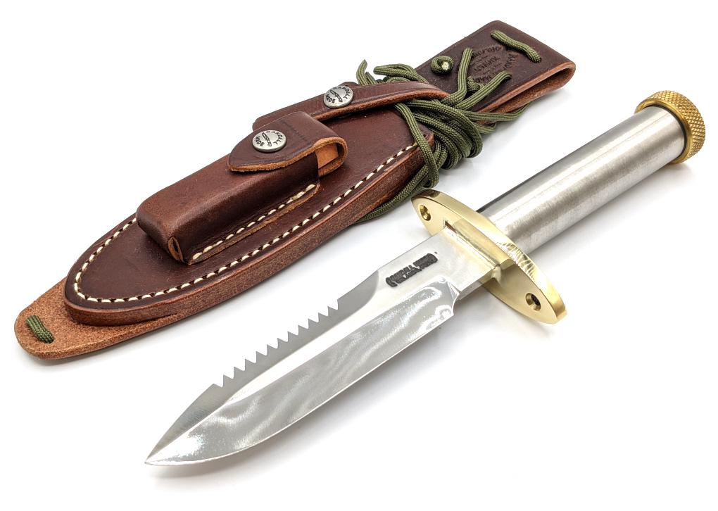 Randall Made Model 18 Attack Survival w/ Sheath: Randall Made Model 18 Attack Survival Knife w/ Randall Sheath. Knife comes with hollow metal handle, brass guard, and threaded butt cap. Knife is in like new condition. Blade length of 5in and overall