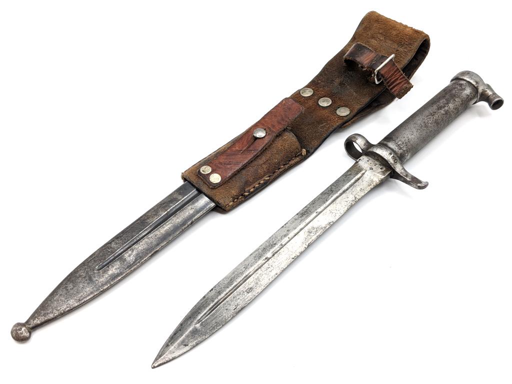 83 Swiss Mauser Bayonet w/ Frog and Scabbard: 83 Swiss Mauser Bayonet w/ Frog and Scabbard. Knife is in nice condition with finish loss on the blade and handle from age and handling. Blade length of 8-1/4in and overall length of 13in.