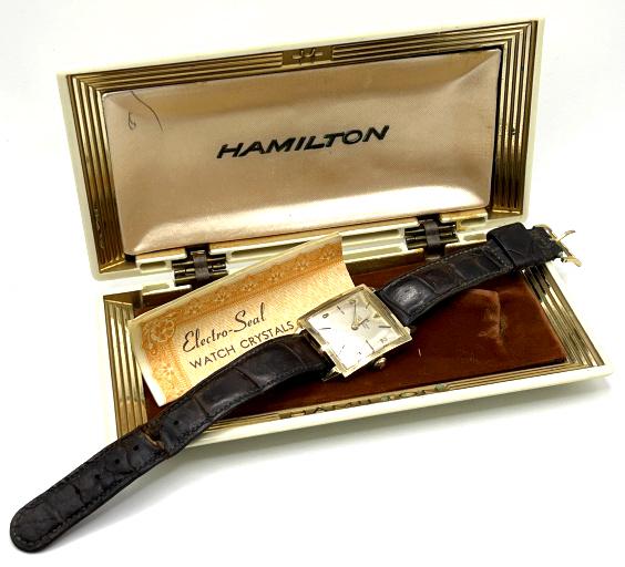 14k Yellow Gold Hamilton Masterpiece Watch: 1960s 14K Yellow Gold Hamilton masterpiece wrist watch. Automatic Swiss Made. Monogrammed on back " Presented to W.F Ryan in Appreciation of 25 Years Service With The Quaker Oats Company" Currently ru