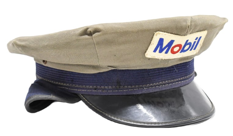 Vintage Mobil Oil Gas Station Attendant's Hat: Unique vintage Mobil Oil service station attendant's visor cap with cold weather ear flaps by Kant Krack . Has some discoloration and wear from use and age. Marked a size Large.
