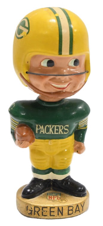 Vintage 1960s Green Bay Packers Football Noddder: Original vintage Green Bay Packers Football nodder / bobblehead. Appears to be in overall good condition with paint loss and wear from display and age. Measures approximately 7" tall.