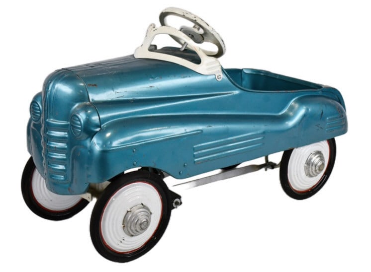 Repainted Steelcraft Pontiac Pedal Car: Repainted Steelcraft Pontiac pedal car. The car has an older repaint and it is missing the front bumper. The car has paint chips and wear from play and age. Measures approximately 34" long.