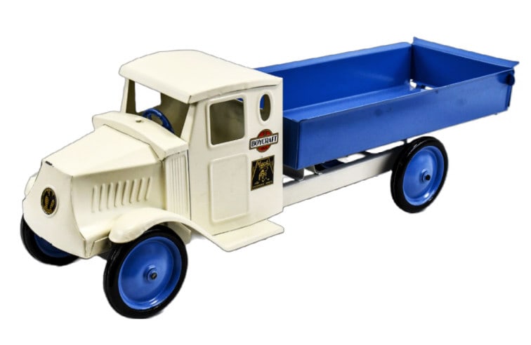 Restored Steelcraft / Boycraft Mack Dump Truck: Restored Steelcraft / Boycraft Mack dump truck. Boycraft was a toy line produced by Steelcraft only to be supplied at Sears-Roebuck. The bed dumps and the tailgate opens. The truck has a chip on the n