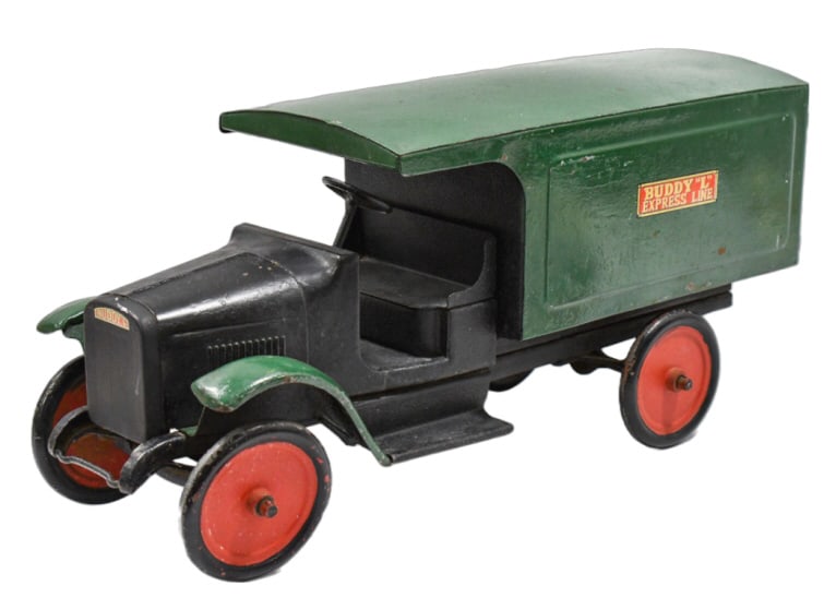 Repainted Buddy L Express Line Delivery Truck: Buddy L Express Line delivery truck. The truck has an old repaint / amateur restoration. The truck has some pitting under the paint. It is missing one of the latches on the doors, but other than that