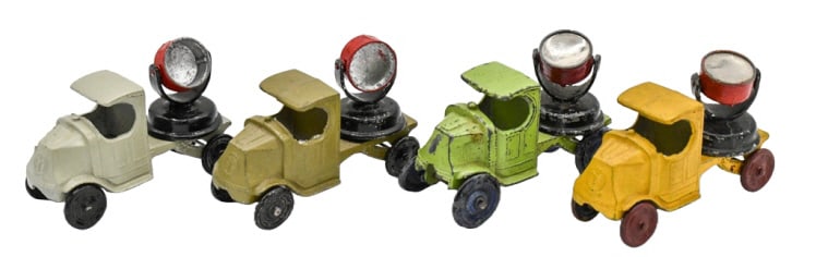 (4) Tootsietoy Mack Searchlight Trucks: (4) Tootsietoy Mack searchlight trucks. Conditions vary from restored to nice originals. The light is missing the lense. Each measures approximately 2-3/4" long.