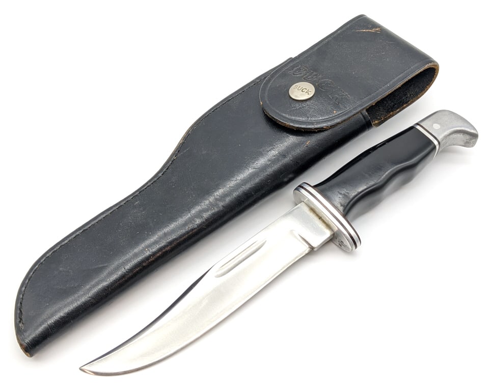 Buck 119 Fixed Blade Hunting Knife w/ Sheath: Buck 119 Fixed Blade Hunting Knife w/ Sheath. Knife is in nice used condition with material loss and scratches from sharpening. Blade length of 6in and overall length of 10-1/2in.