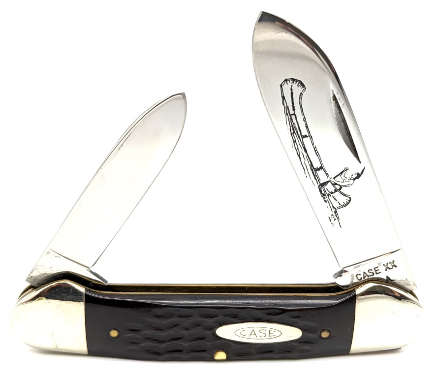 1975 Case XX Dark Brown Jig Bone Canoe Knife 62131: 1940-64 Case XX Jigged Bone Pen Knife 62042. Knife is in nice condition with original blades with some discoloration and carbon spotting and some wear on the bolsters from handling. Largest blade leng