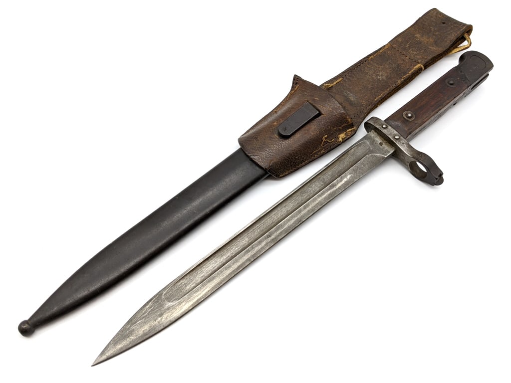 Austro-Hungarian Model 1895 Mannlicher Bayonet: Austro-Hungarian Model 1895 Mannlicher Bayonet w/ Scabbard and Frog. Knife is manufactured by Femaru Fegyver Gepgyar (F.G. GY) in Budapest and is in used aged condition with minimal wear on the blade 