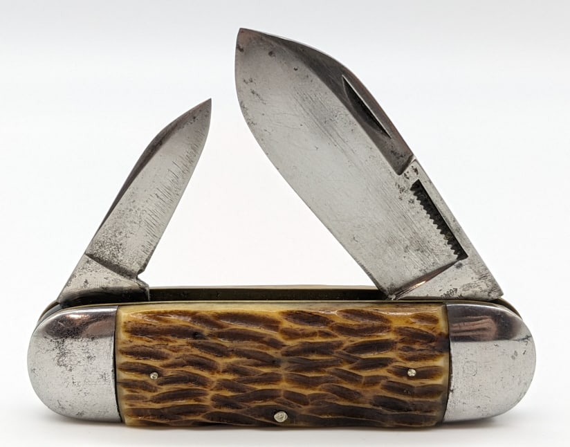 Rosenbaum & Mogul Cutlery Elephants Toe: Rosenbaum & Mogul Cutlery Jigged Bone Elephants Toe Style Knife. Knife is in original condition with scuffs on the blades and some carbon spotting. Knife is in good original condition. Largest blade l