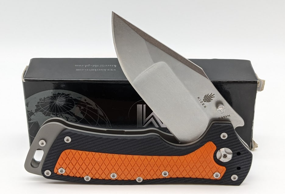 NIB Kizer Glenn Klecker G-10 Orange/Black Flipper: NIB Kizer Glenn Klecker G-10 Orange/Black Flipper Knife Ki4437. Knife features stonewash blade and titanium handle with orange and black synthetic scales. Blade length of 3-3/4in and overall length of