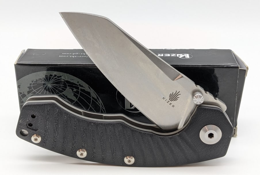 NIB Kizer Tomcat Tigon Frame Lock Flipper Ki4450: NIB Kizer Tomcat Tigon Frame Lock Flipper Ki4450. Knife features stonewash blade and titanium handle with black synthethic scales. Blade length of 3-3/4in and overall length of 8-1/2in when open.