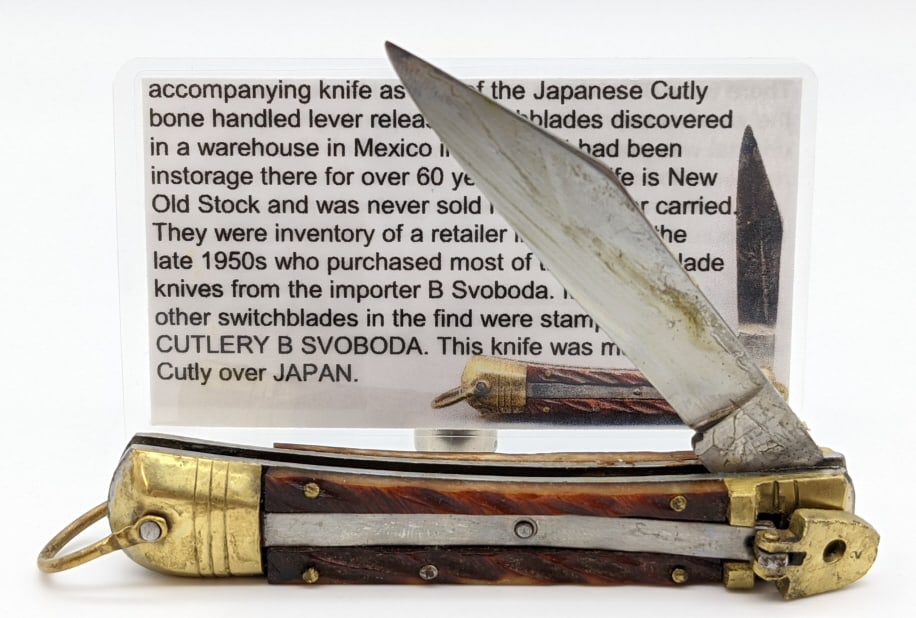 Cutly Japan Lever Lock Bone Switchblade: Cutly Japan Lever Lock Bone Switchblade w/ Note of Provinance. Knife is new old stock found in storage at a retailers in Mexico. Knife has wear from age and has never been cleaned or used. Blade lengt