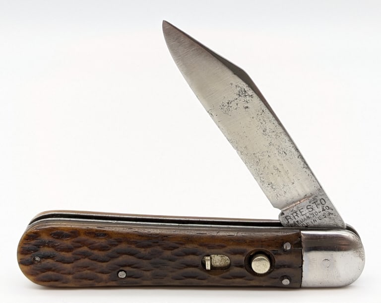 1930-40 Schrade Presto Bone Switchblade: 1930-40 Schrade Presto Bone Switchblade. Knife is in good condition with polished blade with traces of pitting and some carbon spotting. Blade length of 3-1/4in and overall length of 7in when open.