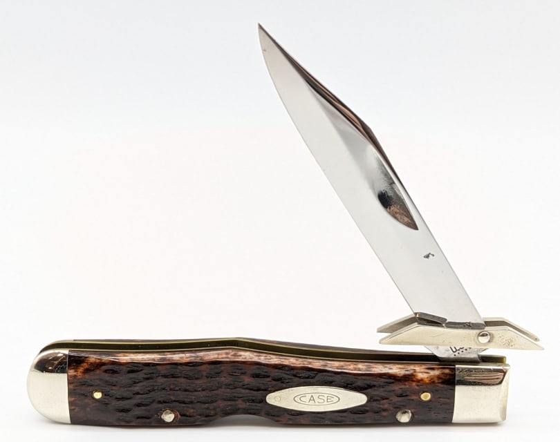 1975 Case XX Bone Handle Cheetah 6111 1/2: 1976 Case XX Bone Handle Cheetah 6111 1/2. Knife is in very nice condition with polished blade and minor wear from handling. Blade length of 3-5/8in and overall length of 8in when open.