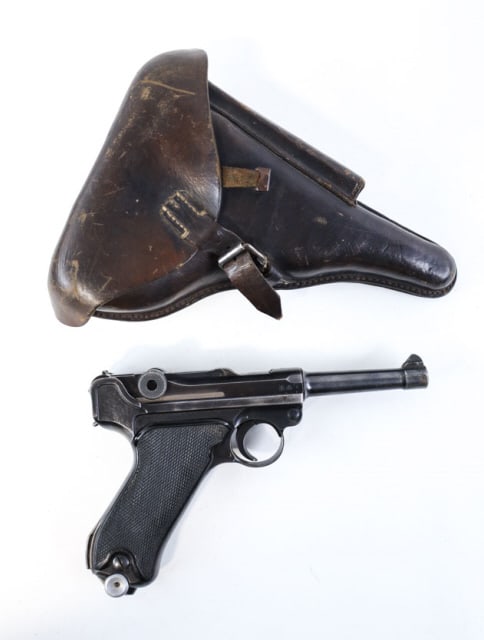 WWII Mauser P.08 Luger 9mm Semi-Auto Pistol: 1941 WWII German Mauser P.08 semi-automatic Luger in 9mm. The blued pistol has a 3-7/8" barrel and is in nice condition with use wear. The serial numbers are all matching. Comes with black after-marke