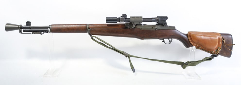 WWII Springfield Armory .30-06 US M1D Garand Rifle: 1944 WWII Springfield Armory U.S. M1 D Garand semi-automatic rifle in .30-06 Springfield. The rifle is in great used condition and the barrel measures 24" long. Comes with Hart M2 flash hider, sling,