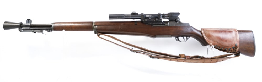WWII Springfield Armory .30-06 US M1C Garand Rifle: 1944 WWII Springfield Armory U.S. M1C Garand semi-automatic rifle in .30-06 Springfield. The rifle is in nice used condition and the barrel measures 24" long. Comes with Hart M2 flash hider, leather s