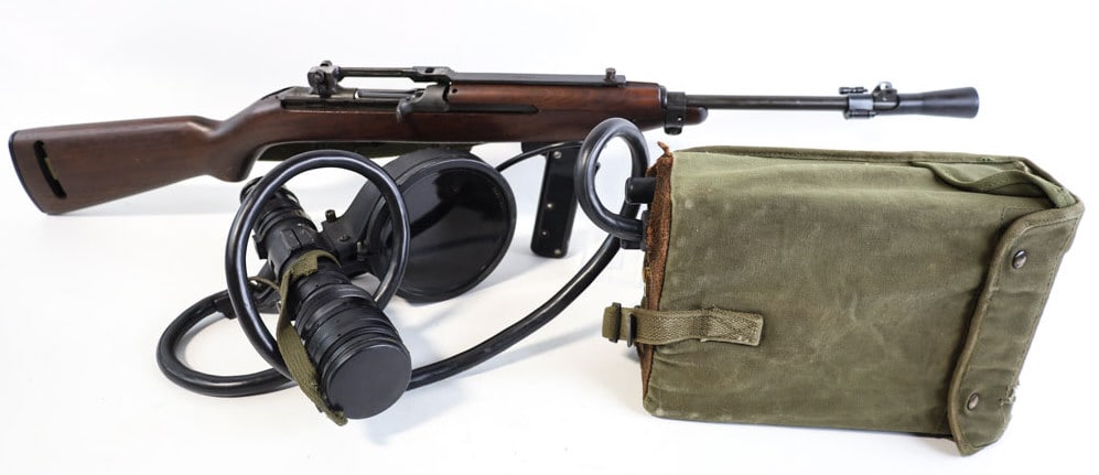 WWII Inland Division .30 Cal U.S. M1 Carbine: WWII Inland Division U.S. M1 semi-automatic carbine in .30 caliber. The carbine is in nice condition and the barrel measures 18" long. Comes with infrared scope with battery pack and a M3 Flash Hider.