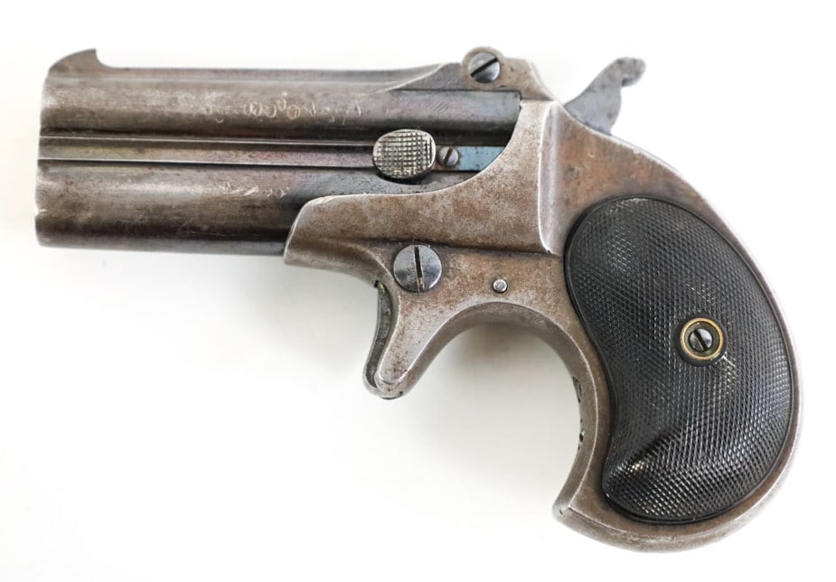 Remington Type II .41 Caliber Double Derringer: Remington Type II over and under Double Derringer in .41 caliber. The blued double-barrel derringer has 3" barrels and is in good condition with age and use wear. SN: 502. FFL transfer required. (1037