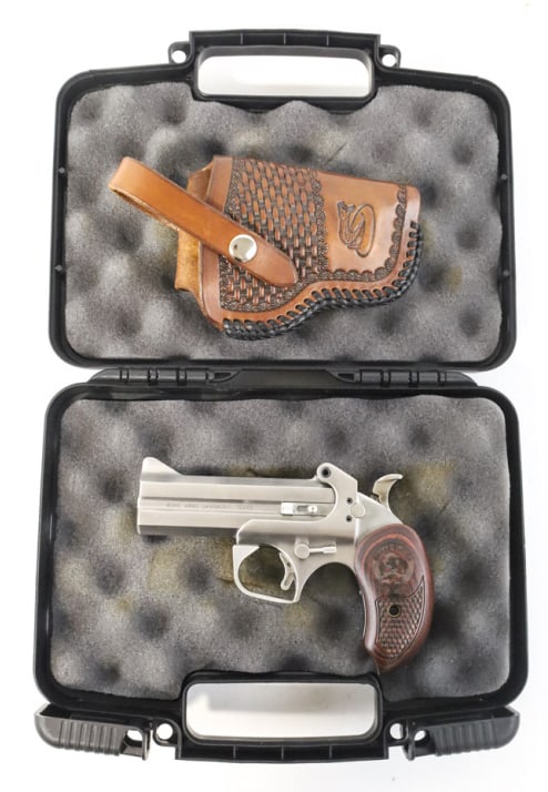 Bond Arms Snake Slayer IV .45/.410 Derringer NIB: Bond Arms Snake Slayer IV derringer in .45 Colt & 3" .410 gauge. The stainless double-barrel handgun has 4-1/4" barrels. The derringer is in new condition in the original Bond Arms hard plastic case w