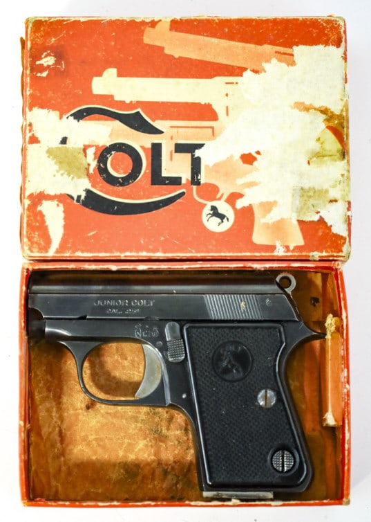 1958 Colt Junior .25 Cal. Semi-Auto Pistol In Box: Spanish made Colt Junior semi-automatic pistol in .25 caliber. The blued finish pistol is in nice used condition and has a 2.25" barrel. Includes the original Colt box. Manufactured in 1958. SN: 1709C