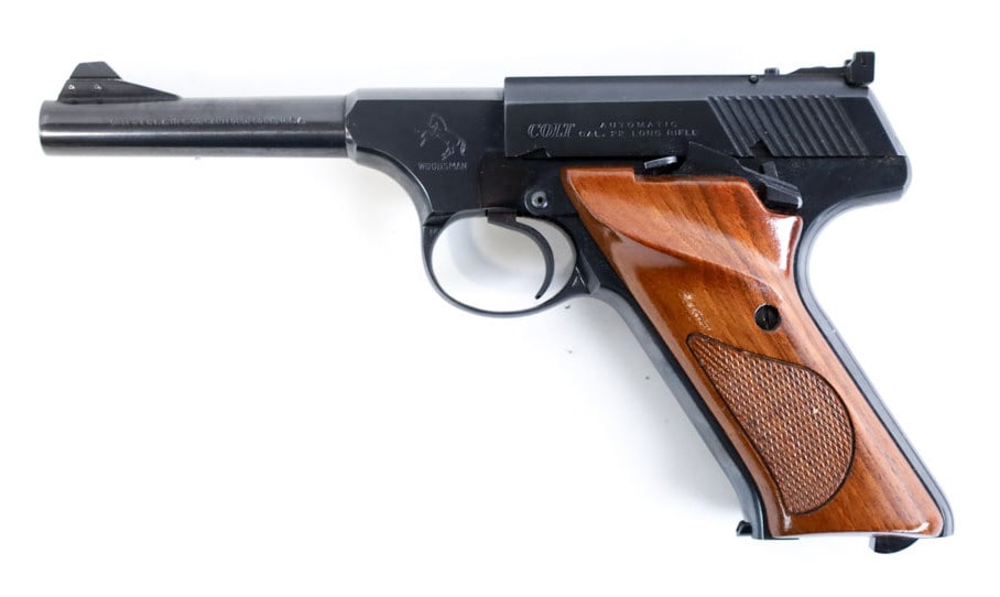 1950 Colt Woodsman .22 LR Semi-Automatic Pistol: 1950 Colt Woodsman Sport Model semi-automatic pistol in .22 Long Rifle. The blued finish pistol is in great near new condition with a 4.5" barrel. Manufactured in 1950. SN: 046989 S. Requires FFL tran