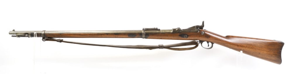 U.S. Springfield Model 1884 .45-70 Trapdoor Rifle: U.S. Springfield Model 1884 breech loading trapdoor single shot rifle in .45-70-500. The rifle has a 32.625" barrel and is in very nice condition with use and age wear. Bore and rifling are good, incl