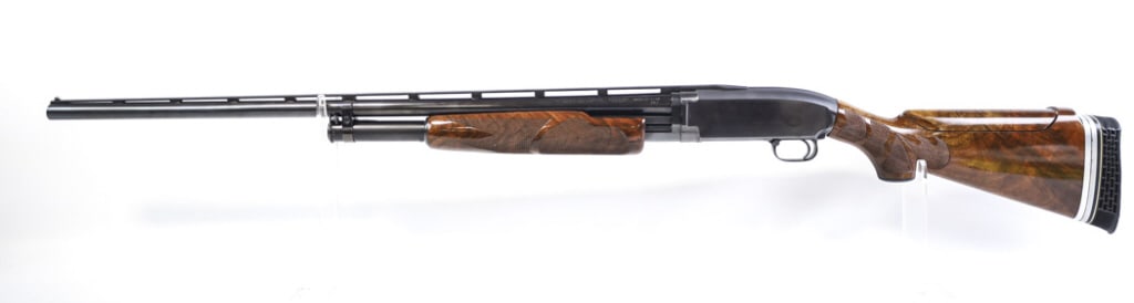 Winchester Model 12 Trap 12 Gauge Pump Shotgun: Beautiful Winchester Model 12 original factory trap pump action shotgun in 12 gauge. The shotgun has deluxe wood with an adjustable comb and pad, has a 30" full choke vented factory trap barrel. The c