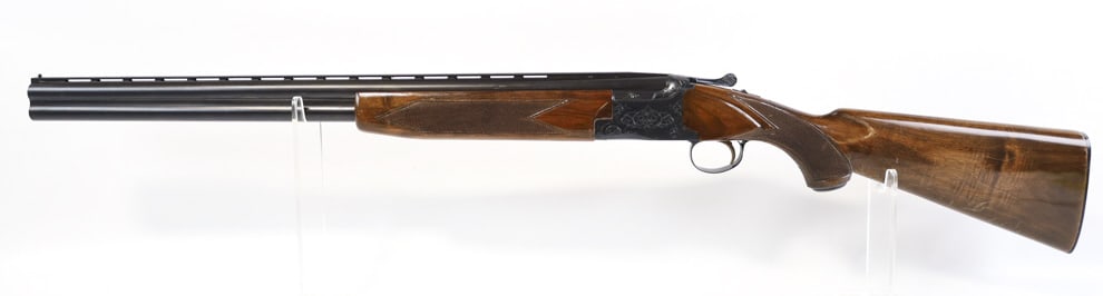Winchester Model 101 12 Ga. Over & Under Shotgun: Winchester Model 101 over and under shotgun in 12 gauge. The shotgun has 26" vented barrels with nice condition bores. It is in nice condition with some use wear. SN: 74277. FFL transfer required. (16