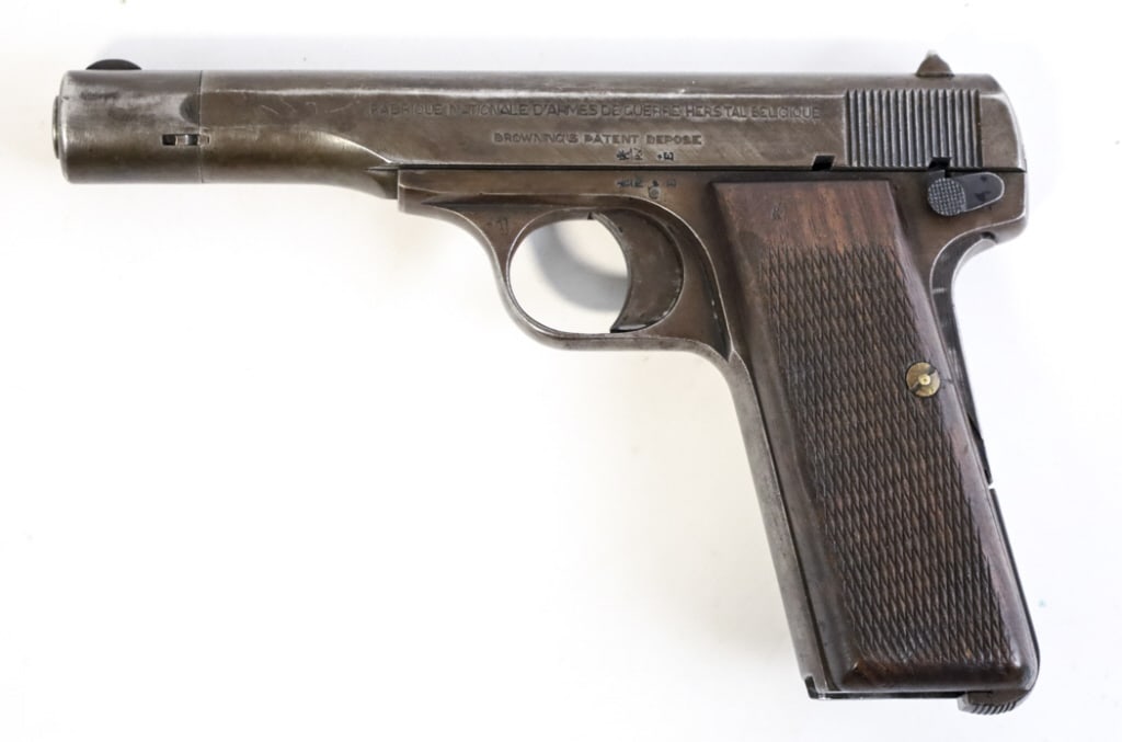 Belgium FN Model 1922 .32 ACP Semi-Auto Pistol: Belgium FN Model 1922 semi-automatic pistol in .32 ACP (7.65mm Browning). The blue finish pistol is in good condition with use and age wear and has a 4.5" barrel. The Model 1922 was considered a milit