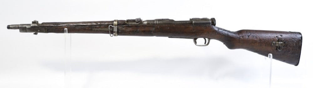 WWII Japanese Meiji Arisaka 6.5mm Carbine: WWII Japanese Meiji Arisaka Type 38 bolt action Calvary carbine in 6.5mm. The carbine is in fair condition with lots of war wear and has a 19.25" barrel. Has a partial mum, not ground but worn. Bore a