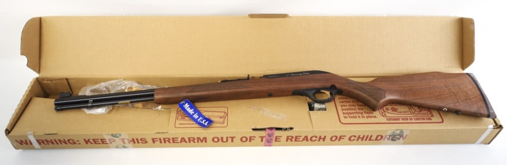 Marlin Model 60DLX 50th Anniv. .22 LR Rifle NIB: Marlin Model 60DLX 50th Anniversary Edition semi-automatic rifle in .22 long rifle. The rifle has a 19" barrel with folding rear sight and walnut stock. Comes new in the original box with instructions