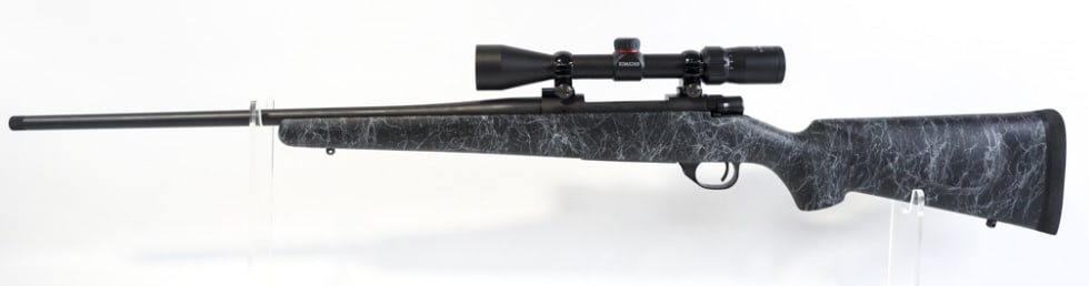 Howa Model 1500 .30-06 Sprg. Bolt Action Rifle: Japanese Howa Model 1500 bolt action rifle in .30-06 Springfield. The rifle has a 22" threaded barrel and is in great near new condition. Comes with a Simmons 8-Point 3-9 x 40 scope. SN: B669249. FFL