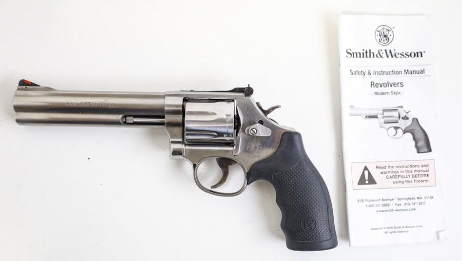 Smith & Wesson Model 686-6 .357 Magnum Revolver: Smith & Wesson Model 686-6 seven-shot revolver in .357 Magnum. The stainless revolver has a 6" barrel and is in nice used condition. Comes with instructions. SN: DDD6098. FFL transfer required. (600-9