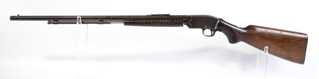 Savage Model 1914 .22 S-L-LR Pump Action Rifle: Savage Arms Model 1914 pump action rifle in .22 S-L-LR. The rifle has a 24" octagon barrel and is in good condition with use wear, bore and rifling are decent. Has a repair to the butt stock behind th