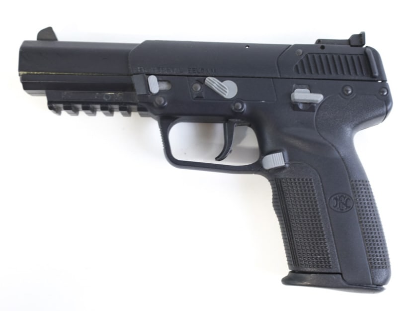 FN Five-seveN 5.7 x 28mm Semi-Automatic Pistol: FN Herstal Belgium Five-seveN semi-automatic pistol in 5.7 x 28mm. The black finish pistol is in nice used condition and has a 4.75" barrel. SN: 386180842. Requires FFL transfer. (691-9)